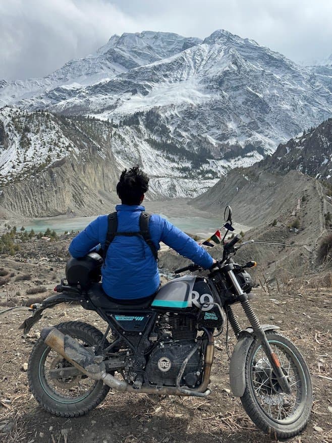 On a Royal Enfield above a glacial valley, on the way to Tilicho
